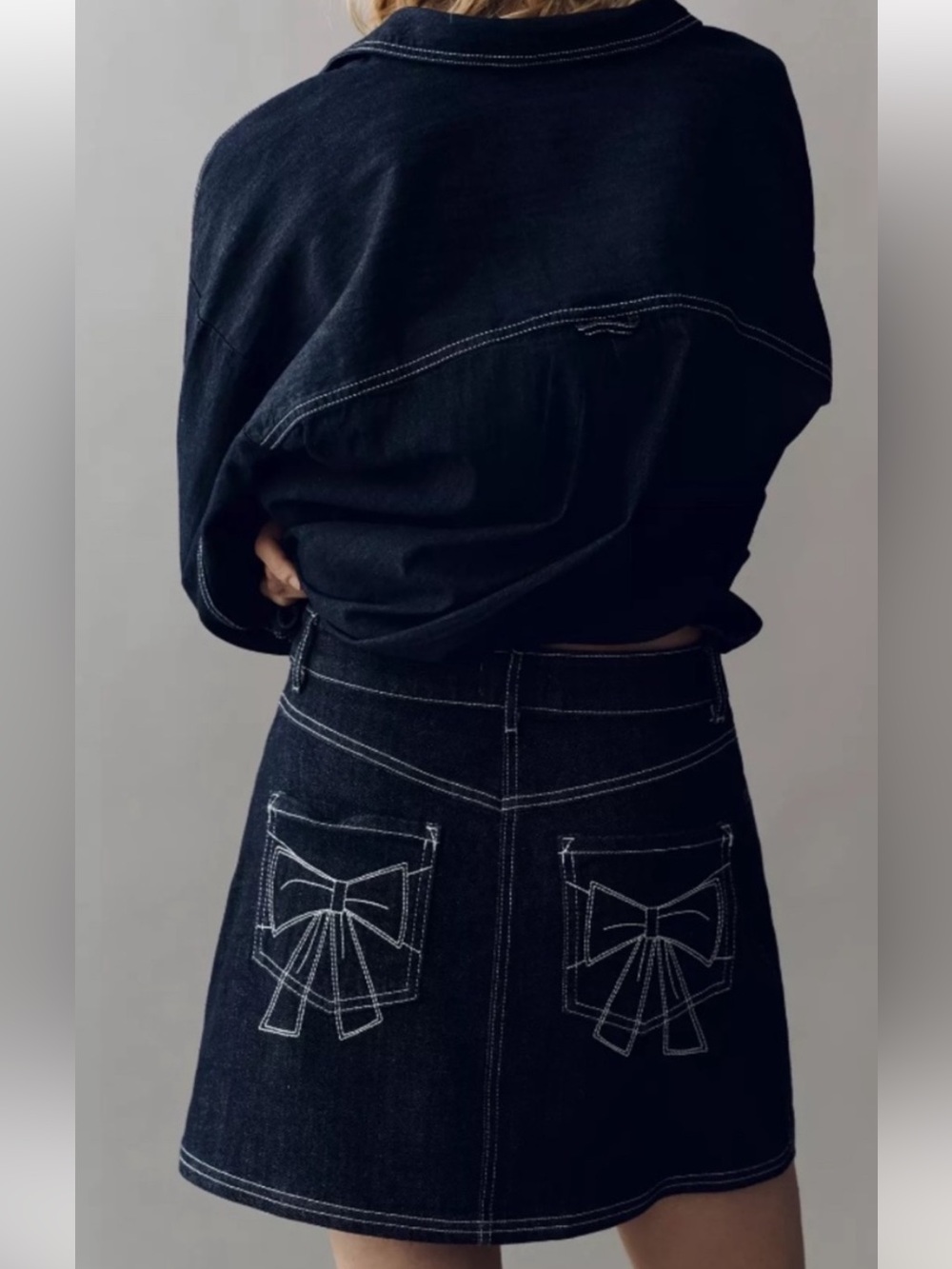 Anthro Pilcro denim mini skirt with bow details. NWT sz xs